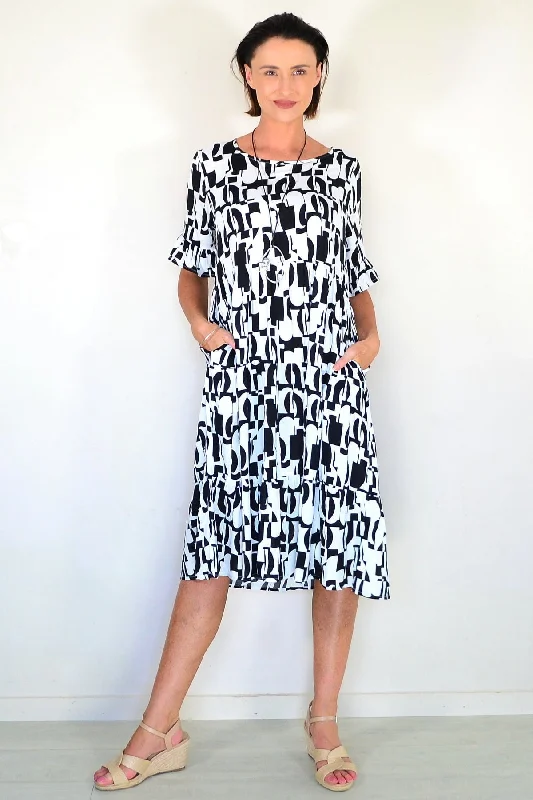 TunicTopOasisBlack White Abstract Tiered Tunic Dress